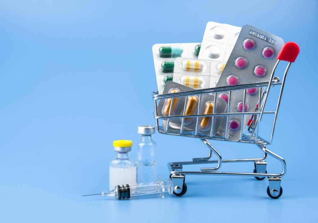 A shopping cart filled with pills