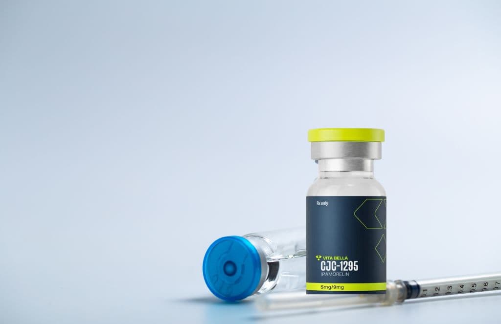 A Vita Bella CJC-1295 vial overlayed on a stock image of a needle and some other vial